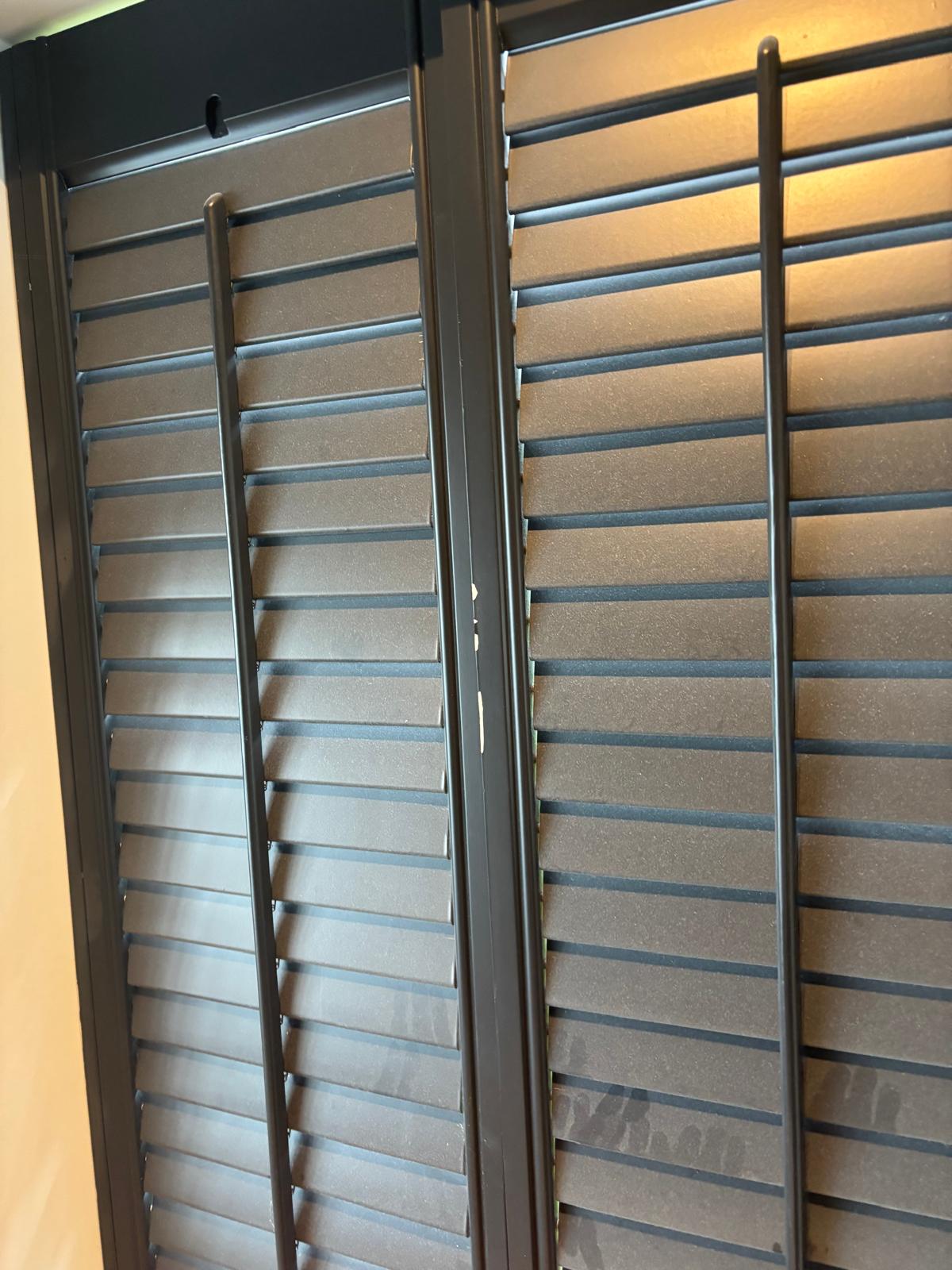 Dusty shutters before detailed cleaning