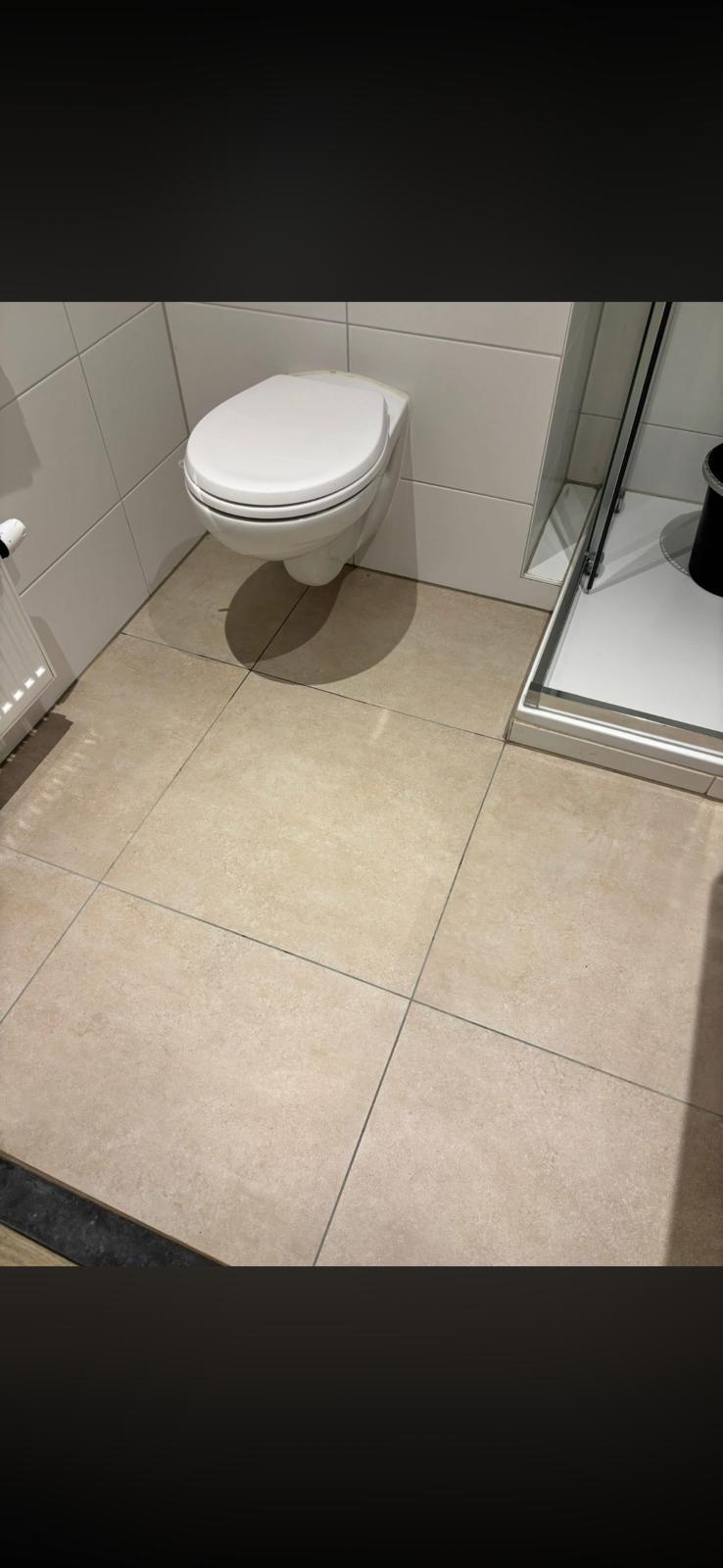 Clean bathroom floor after detailed rental property cleaning